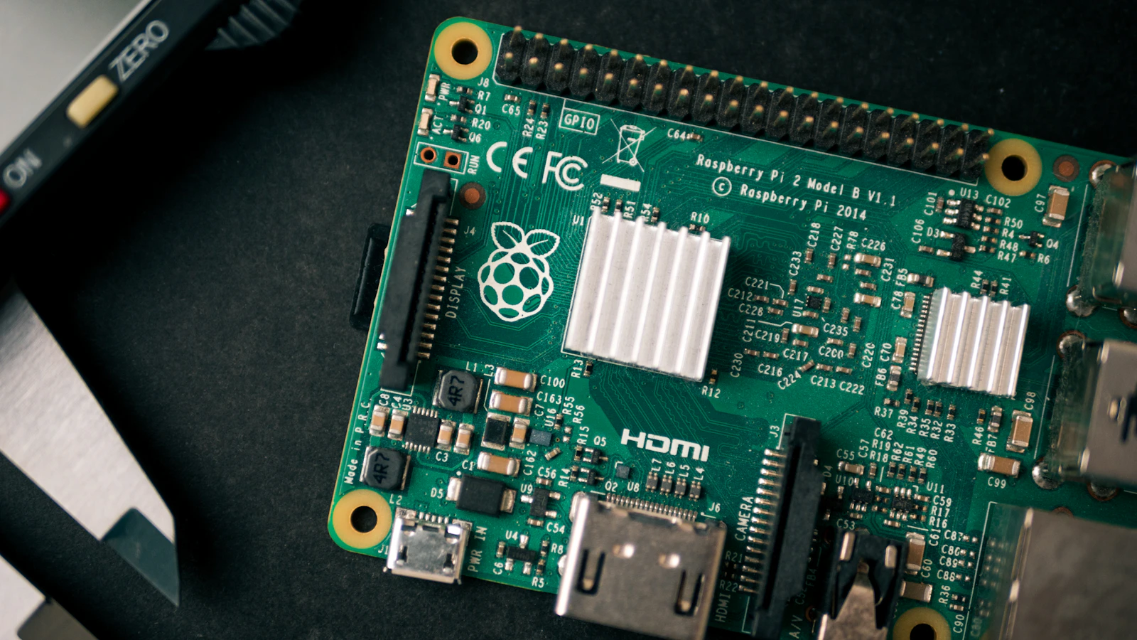 Stock photograph of a Raspberry Pi single-board computer with GPIO pins and connected cables